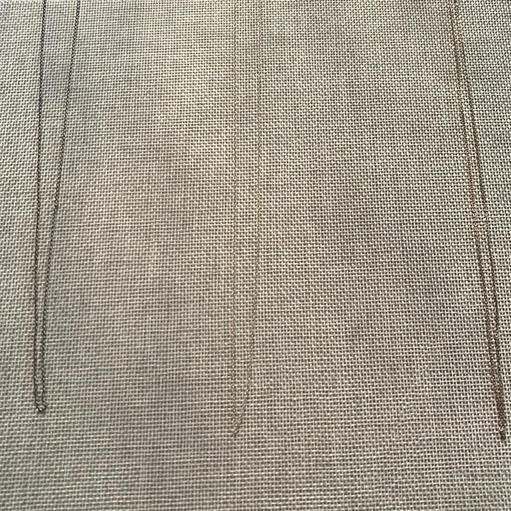 Lot of 3 sterling and silver- toned chains